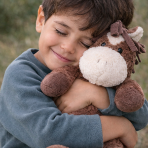 Regalo peluche burro con niño
